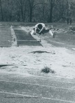 Bridgewater College, Duane Harrison jumping at the Alumni Track Meet, 3 May 1986 by Bridgewater College