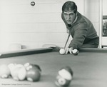 Bridgewater College, Dan Legge (photographer), Photograph of Earl Walker 'Buddy' Bosserman shooting pool, circa 1970 by Dan Legge