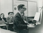 Bridgewater College, Dan Legge (photographer), Photograph of John Barr playing and singing for students, circa 1970 by Dan Legge