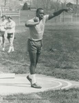Bridgewater College, Action photograph of Greg Brogdon throwing shot put, Spring 1984 by Bridgewater College
