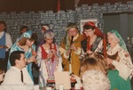 Bridgewater College, Photograph of Dr. John Barr, Pat Dellett and other women performing at the Madrigal Dinner, 1990 by Bridgewater College