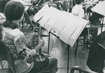 Bridgewater College, A student holding a trumpet behind a music stand, circa 1972 by Bridgewater College