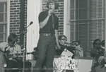 Bridgewater College, Photograph of a soloist, Curtis Nolley, performing with a band, undated by Bridgewater College