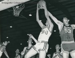 Bridgewater College Men's basketball action photograph of Eddie Cook grabbing the rebound, circa 1965 by Bridgewater College