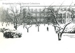 Bridgewater College, Students in snow on campus mall with Bowman Hall in background, undated by Bridgewater College