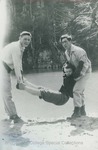 Bridgewater College, Photograph of men pretending to throw a woman in water, 1946 by Bridgewater College