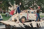 Bridgewater College, Gregg Riddiford (photographer), Photograph of Chris Clark and others on a vintage car float in the Homecoming Parade, Sept 1989 by Gregg Riddiford