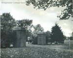 Bridgewater College, Couple walking through entrance gates, 1949 by Bridgewater College