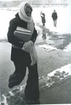 Bridgewater College, Student bundled up walking to class in snow, circa 1974 by Bridgewater College