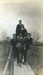 Bridgewater College, Men from class of 1924 standing on swinging bridge at North River, circa 1923 by Bridgewater College