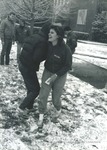 Bridgewater College, Susan Eagle and others unidentified laughing during light snow in front of library, 25 January 1986 by Bridgewater College