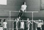 Bridgewater College, A student on uneven bars, undated by Bridgewater College