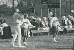 Bridgewater College, cheerleaders cheering at a football game, circa 1967 by Bridgewater College