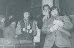 Bridgewater College, People holding candles at the Christmas luminaries, 18 Dec 1985 by Bridgewater College