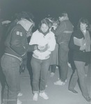 Bridgewater College, People with candles at Christmas luminaries, 18 Dec 1985 by Bridgewater College