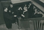 Bridgewater College graduates adjusting regalia, probably 1948 by Bridgewater College