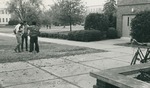 Bridgewater College , Photograph of three students talking outside the Kline Campus Center, 1980 by Bridgewater College