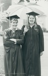 Bridgewater College, Two women in academic regalia under an umbrella, 29 May 1983 by Bridgewater College