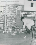 Bridgewater College, Dan Legge (photographer), student overwhelmed by dirty dishes in the Rebecca Hall dining room, circa 1968 by Dan Legge