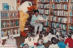 Bridgewater College, A woman reading to children as "Ernie the Eagle" looks on, undated by Bridgewater College