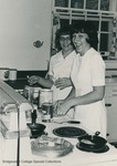 Bridgewater College, Two students laughing as they cook, undated