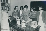 Bridgewater College, R. Weiss (photographer), Students weighing rats in the Nutrition Lab, 1960s