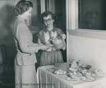 Bridgewater College, Paul Yoder Jr. (photographer), A student serving a beverage to another student, early 1950s by Paul Yoder Jr
