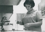 Bridgewater College, A student stirring a dish, undated by Bridgewater College