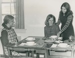 Bridgewater College, Dan Legge (photographer), A student practicing serving another student a meal, circa 1970
