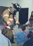Bridgewater College, KDB (photographer), Photograph of students at Little Eagles Playschool meeting a firefighter, 01 Nov 2001 by KDB