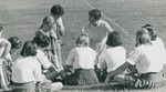 Bridgewater College, Richad Geib (photographer), Coach Laura Mapp talking with field hockey team at halftime, circa 1967 by Richard Geib