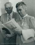 Bridgewater College, Cecil Ikenberry and Effie Early Ikenberry looking at their souvenir booklet, May 1983 by Bridgewater College