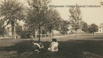 Bridgewater College, People relaxing on the campus mall outside The Red House, undated by Bridgewater College