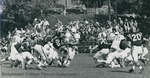 Bridgewater College, Dan Legge (photographer), football game action photo with view of bleachers, circa 1969 by Dan Legge
