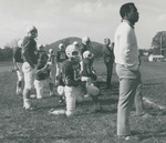 Bridgewater College, Bob Anderson (photographer), standing and kneeling football players with coaches, early 1970s by Bob Anderson