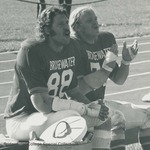 Bridgewater College, Ed Novak (photographer), two football players cheering from the bench, circa 1973 by Ed Novak