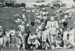 Bridgewater College, Ed Novak (photographer), Football referee making a touchdown call, 1975 by Ed Novak