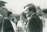 Bridgewater College, Senator Nathan Miller, foreground right, talking with President Wayne F. Geisert, foreground left, 11 April 1980 by Bridgewater College