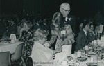 Bridgewater College, Student Lynn Jennings pinning a corsage on a Founder's Day banquet guest, 11 April 1980 by Bridgewater College