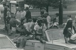 Bridgewater College, Cheerleaders riding on a car in the Homecoming parade, 1971 by Bridgewater College