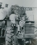 Bridgewater College, A student driving a tractor pulling a float in the Homecoming parade, 1974