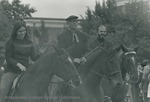 Bridgewater College, A student and professors riding horses in the Homecoming parade, undated by Bridgewater College