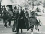 Bridgewater College, Denise Taylor (photographer), A student dressed in a cape leading a student or students dressed as a horse in the Homecoming parade, 1975