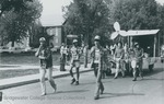 Bridgewater College, Students pulling the Physics Club float at Homecoming, 1982 by Bridgewater College