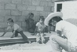 Bridgewater College, Photograph of local boys and a student working at the Guatemala Interterm, 1977 by Bridgewater College