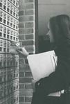Bridgewater College, A student checks her mailbox in the Kline Campus Center, undated by Bridgewater College