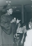 Bridgewater College, Rodney Todd playing a wizard and doing magic tricks at Madrigal Dinner, Dec 1980 by Bridgewater College