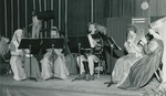 Bridgewater College, Costumed women and Dr. John Barr performing at Madrigal Dinner, Dec 1983 by Bridgewater College