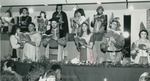 Bridgewater College, Costumed students singing at Madrigal Dinner, Dec 1983 by Bridgewater College