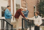 Bridgewater College, Photograph of Clement Bess and Harry J. M. Jopson presenting a medal for the 5K Race, 31 Oct 1992 by Bridgewater College